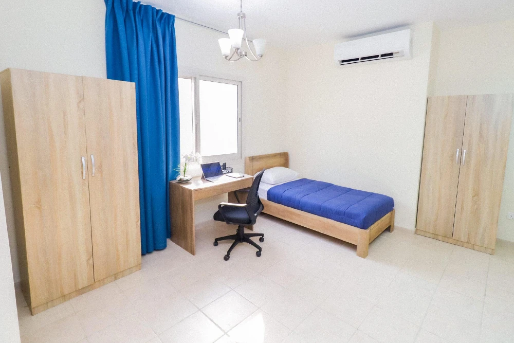 Long stay accommodation in Dubai with furnished room and study desk